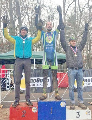 On the podium is first place, Greg Junge; second place, Andrew Hall of Asheville, N.C.; and third is Reid Rhodes of Asheville, N.C. (photo submitted by Greg Junge)