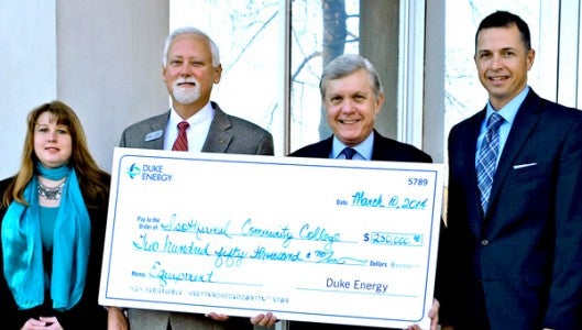 Pic: Representatives from Duke Energy present Isothermal Community College with a $250,000 check to implement the Advanced Skills in Quality Project. The purpose of the project is to help individuals gain certifications and prepare them for high-skilled jobs. (photo submitted by Michael Gavin) 