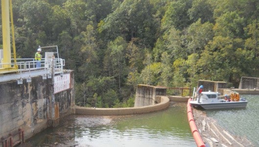 Polk County hired AECOM to perform a required inspection of the Turner Shoals dam at Lake Adger. The inspection was done in October 2013. Pictured is the inspection being performed on Oct. 8, 2013. (photo submitted) 