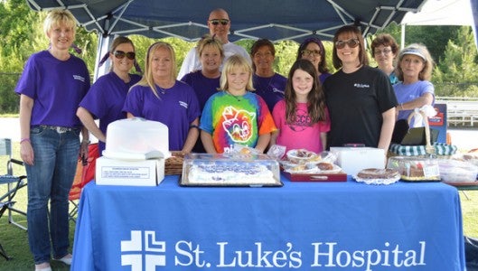 Join us in our fight against cancer at Relay for Life of Polk County! Our annual event will be held Friday, May 2 at Polk County Middle School.  Pictured is last year’s Relay for Life. (photo by Leah Justice) Article on page 3.  