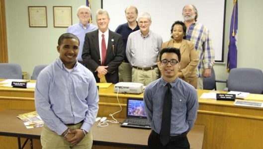 The student body presidents of Chapman High School (Drew Copeland, left, front) and Landrum High School (Brandon Hernandez, right, front) appeared before Landrum City Council on March 10 to share details of the Color Run, a Spartanburg County District 1 Schools-sponsored 5K scheduled to start at 9 a.m. at Landrum Middle School on May 9. The theme of the run is “One Community, One in Fitness, One in Fun” and participants are asked to bring a canned good for a food bank. (Photo by Claire Sachse)