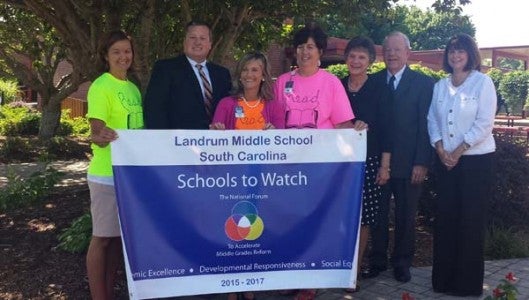 Landrum Middle School joins Mabry and Campobello-Gramling to be nationally recognized as schools to watch. From left to right: Jennifer Henson, Dr. Beason, Dr. Crystal McSwain, Julie Settle, Linda Allen, Larry Allen and Tina Jamison.