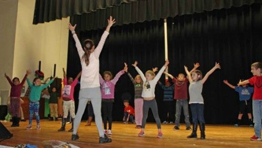 Instructor Sonya Monts is pictured with Ms. Constance’s second grade at Tryon Elementary School.