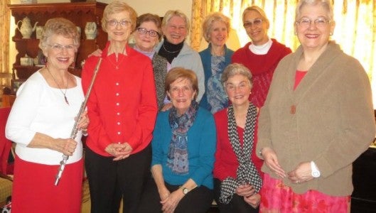 Left to right: Fran Creasy, Jeanette Comer, Janet Joens, Brenda Quilling, Meryt Wilson, Krysti Hamlin, and Marcy Hagen. Seated: Mimi Child Traxler and Jeanette Shackelford. Photo taken by Elaine Grella.