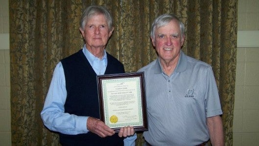 Charles “Chuck” Elder, right, is pictured with Bob Montgomery