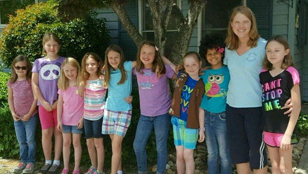 Girl Scout Troop 124, led by Angela Gosnell, recently visited Foothills Humane Society to drop off donations and tour the facility. They learned how the facility works and how all the different sections of the facility are used. The troop thanks Samantha and all the staff at FHS for all that they do for these wonderful animals. Left to right are Abbey Williams, Meredith Peek, Lily Gosnell, Taylor Clark, Cora Lawrence, StorieLane Whiteside, Lauren Beheler, Sadie Gassaway, Troop Leader, Angela Gosnell, and Lacey Gosnell. (photo submitted by Olivia Whiteside)