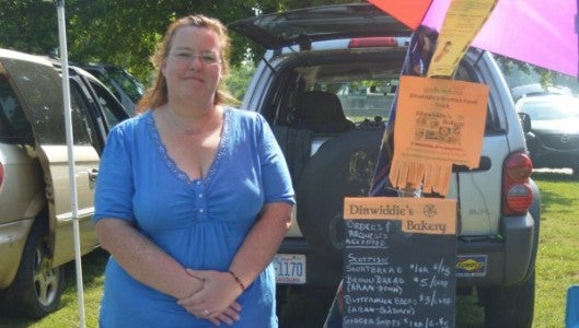 Emily Dinwiddie-Cole has been cooking and baking Scottish and English foods for 25 years and has just opened up a food cart, Dinwiddie’s Bakery, that sells Scottish shortbreads, English scones, ginger cookies and other treats at local farmers markets stretching from the Tryon International Equestrian Center to Columbus and Harmon Field in Tryon. (Photo by Michael O’Hearn)