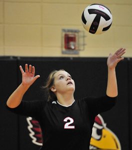 Landrum has just won another point, and it’s time for the Cardinals’ Ellie Ford to serve. (photos by Mark Schmerling)