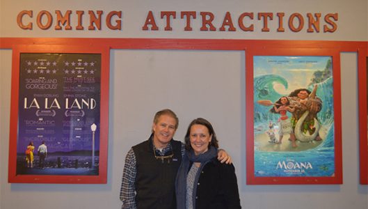 After overseeing the renovation of three buildings on S. Trade Street as part of the Missildine’s project, Scott and Gayle Lane last month bought the Tryon Theatre, built in the 1930s, from Barry Flood, operator of the theatre for 26 years. The full story starts on page 4.  (Photo by Michael O’Hearn)