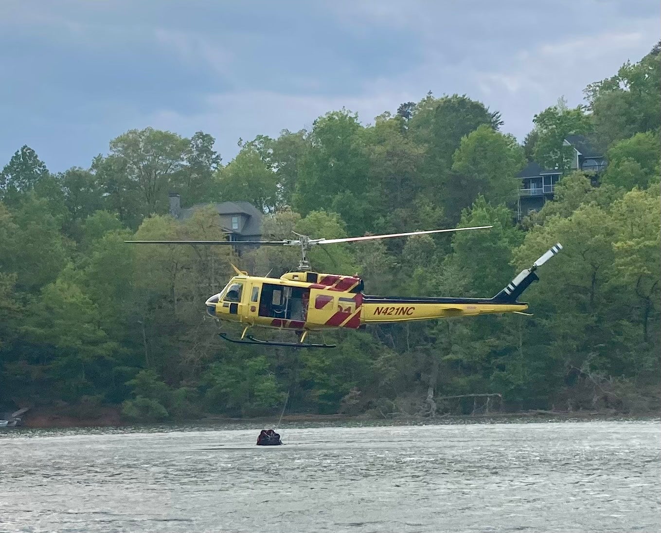 Video: Helicopter retrieves water from Lake Adger to assist with Mill ...